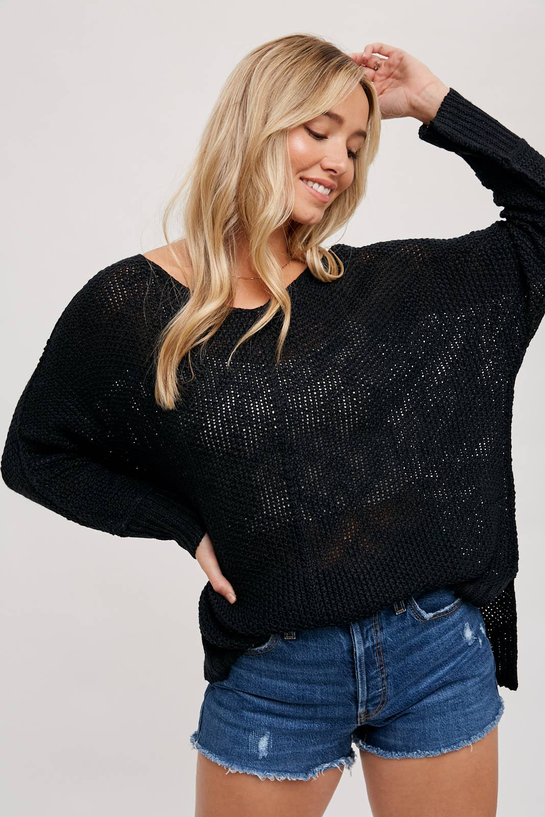 REVERSE SEAM LOOSE FIT SWEATER